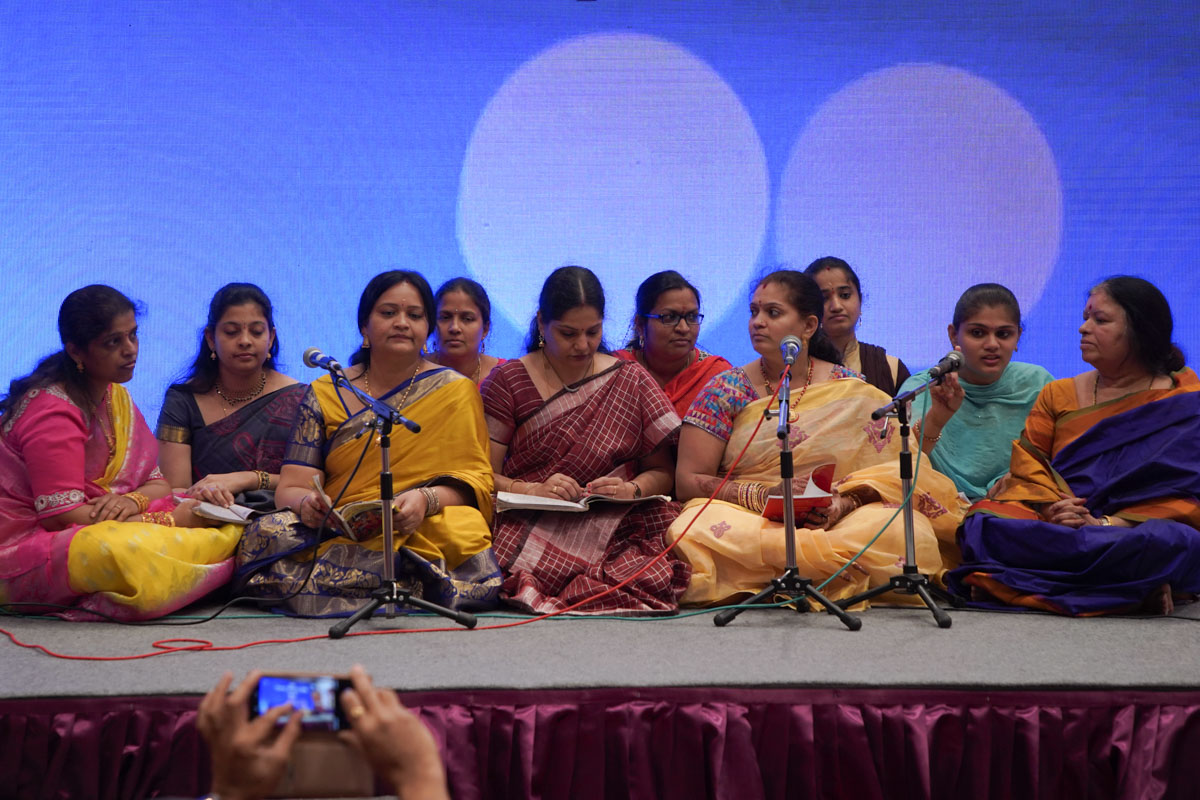 Women devotees of the Shree Karam group sing bhajans