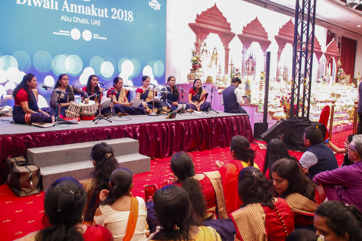 Women devotees sing bhajans