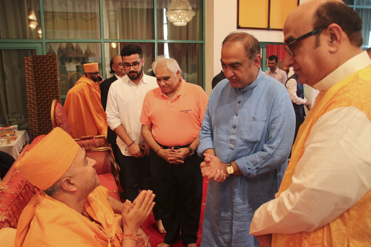 Guests meet Brahmavihari Swami