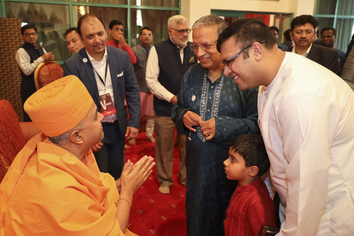 Shri Ram Tolani and family meet Brahmavihari Swami