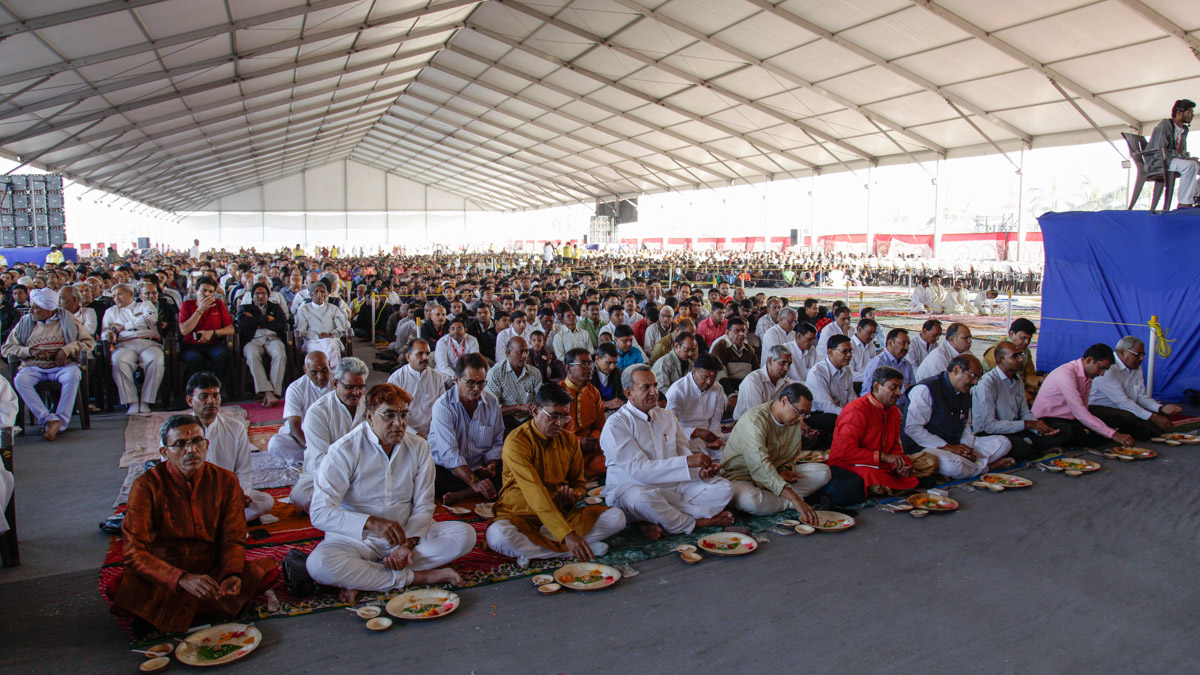 Fathers of the parshads participate in mahapuja rituals