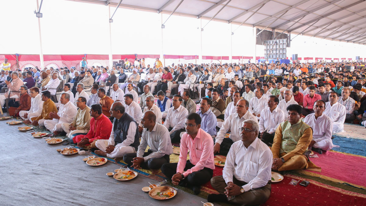 Fathers of the parshads participate in mahapuja rituals