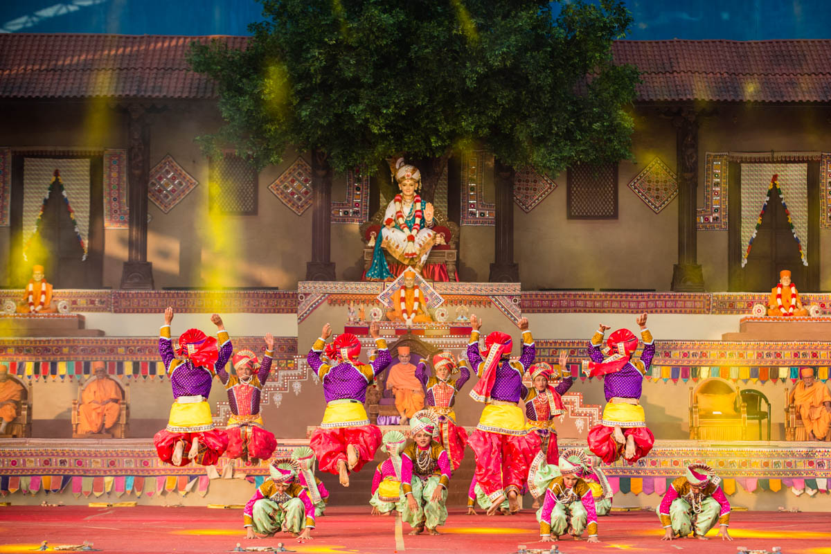 Children and youths perform a traditional dance