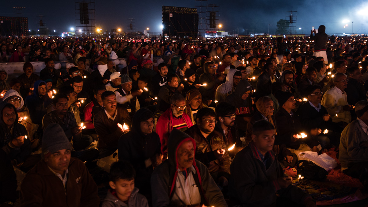 Devotees perform the arti