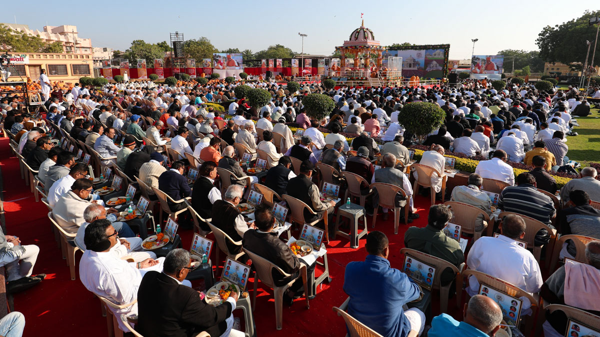 Devotees participate in the mahapuja rituals