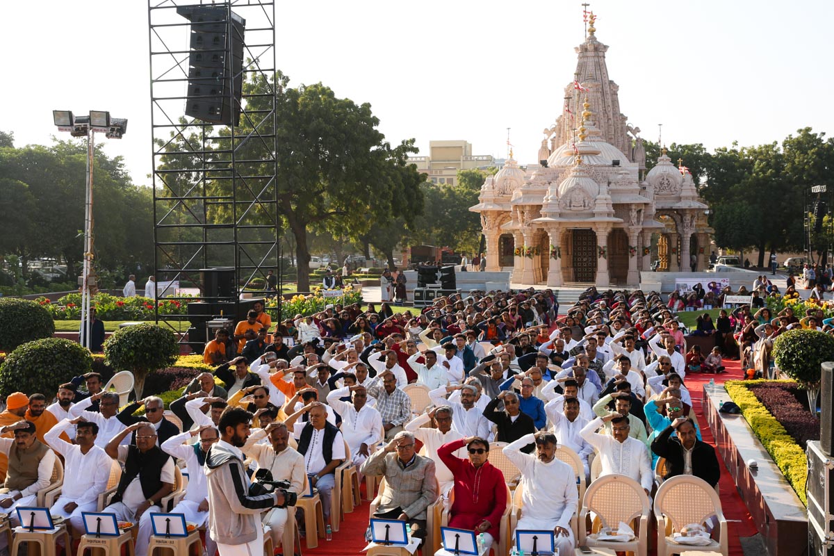 Devotees participate in the mahapuja rituals