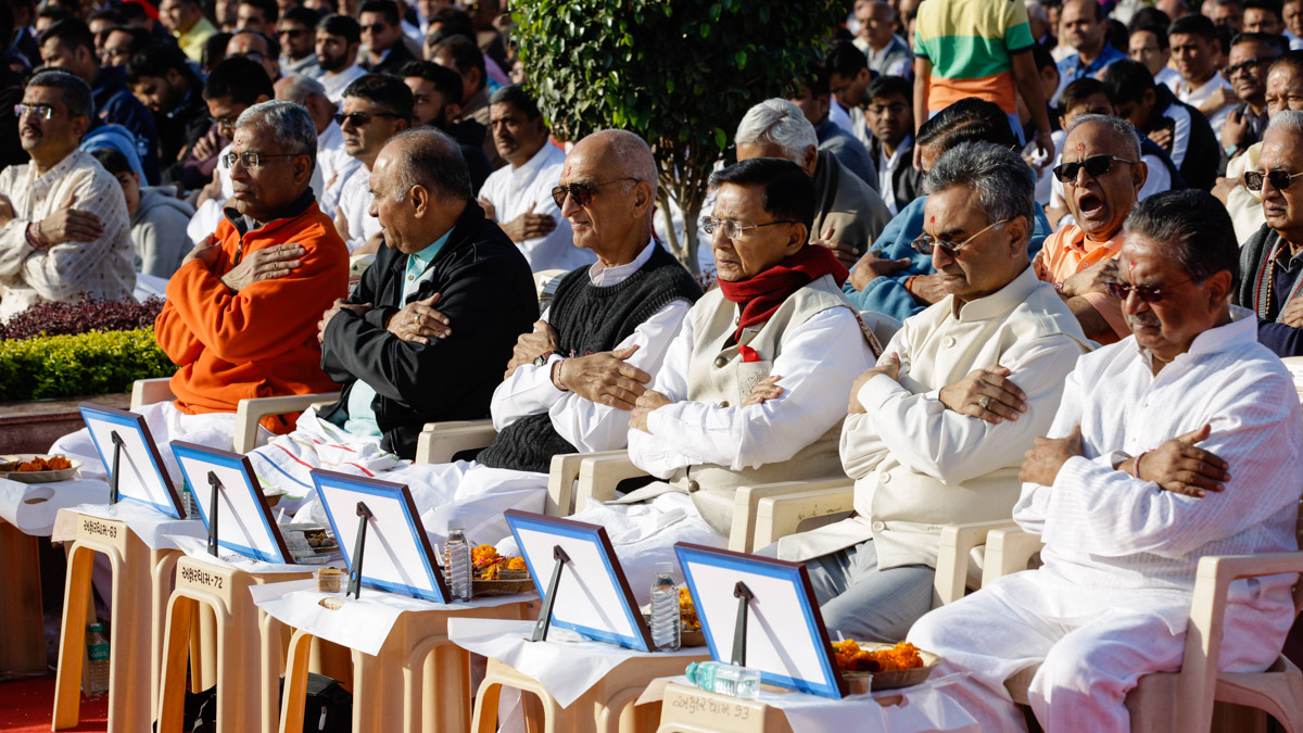 Devotees participate in the mahapuja rituals