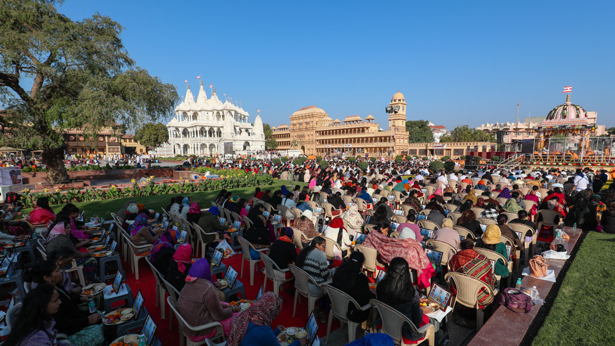 Devotees participate in the mahapuja rituals