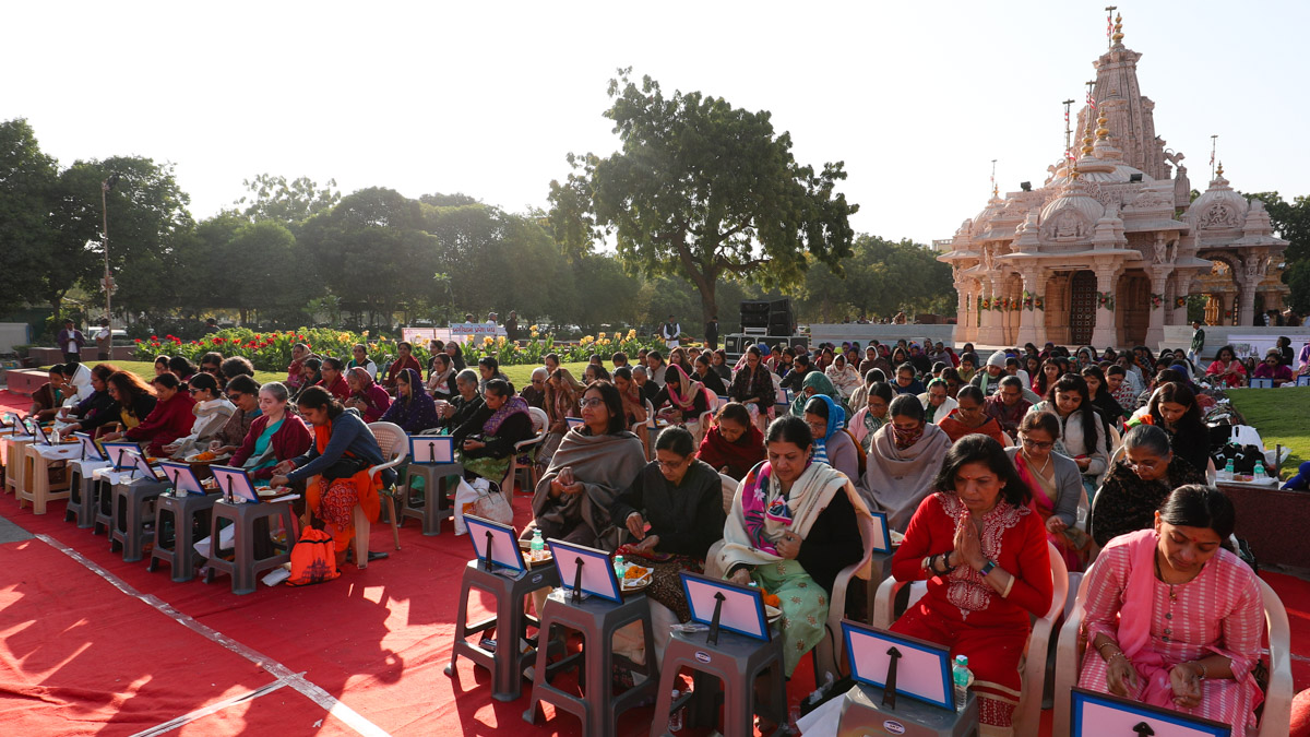 Devotees participate in the mahapuja rituals