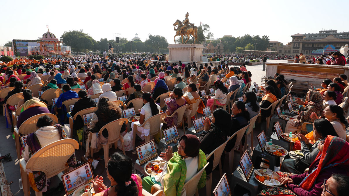 Devotees participate in the mahapuja rituals