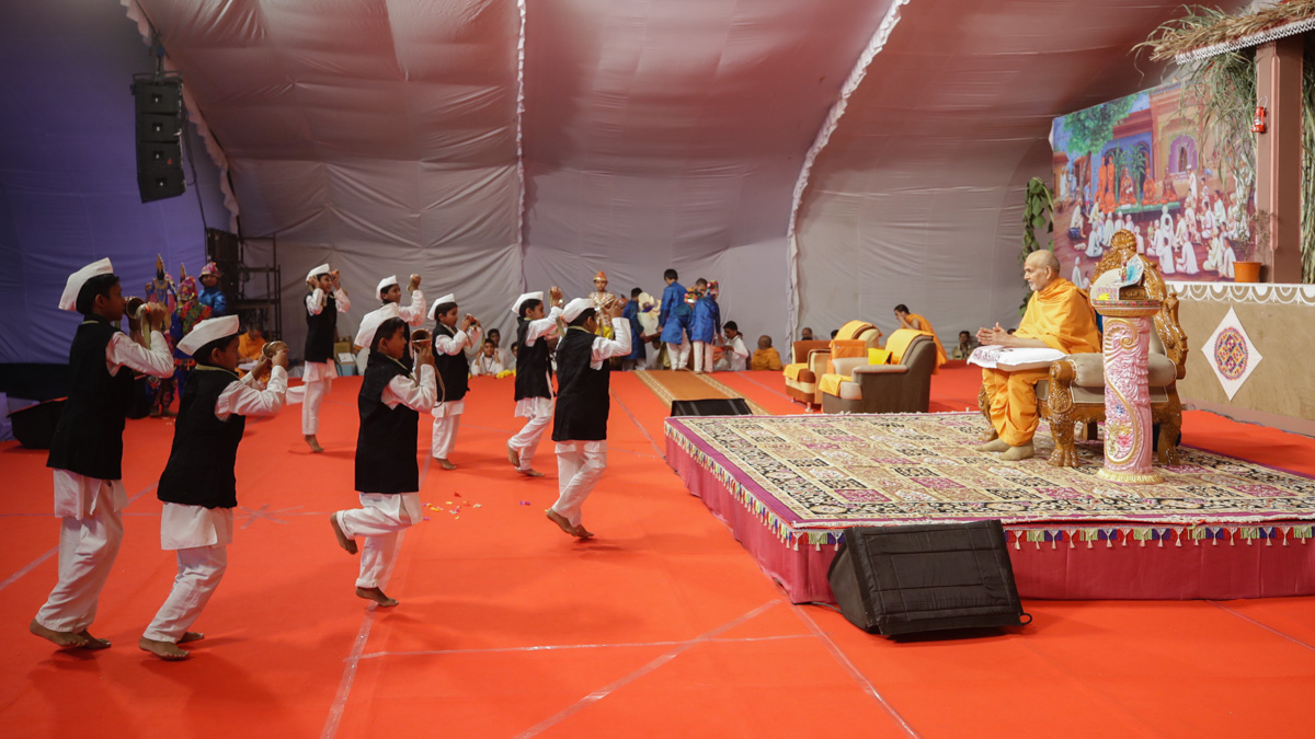 Children perform a welcome dance