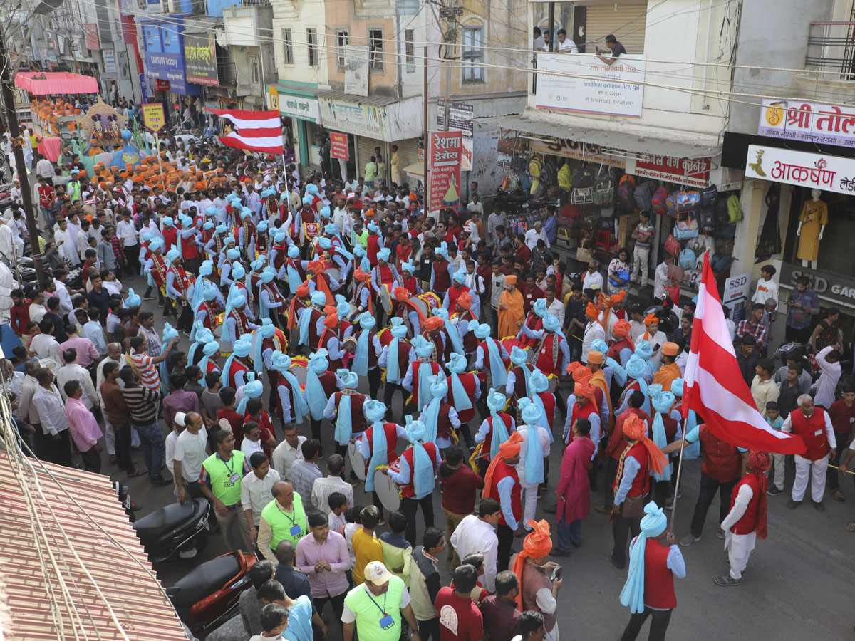 Sadhus and devotees during the procession