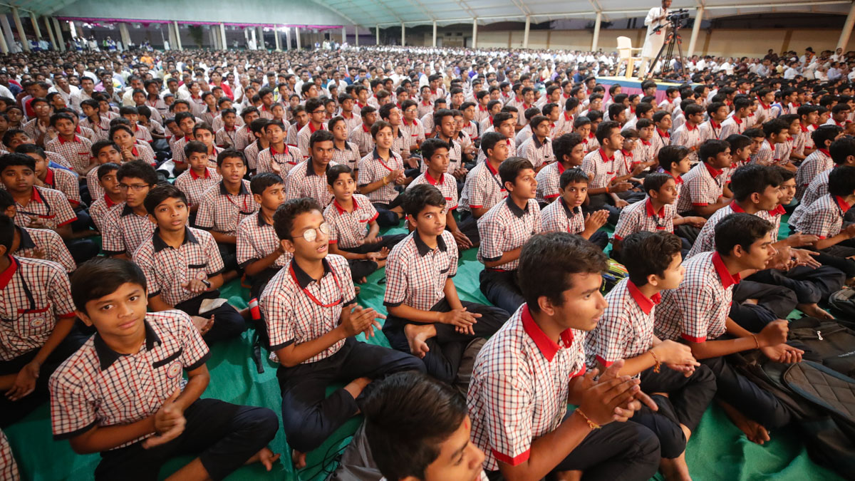 Students of BAPS Swaminarayan Vidyamandir, Valsad, during the evening satsang assembly