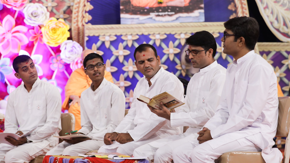 Youths present a skit in the evening satsang assembly