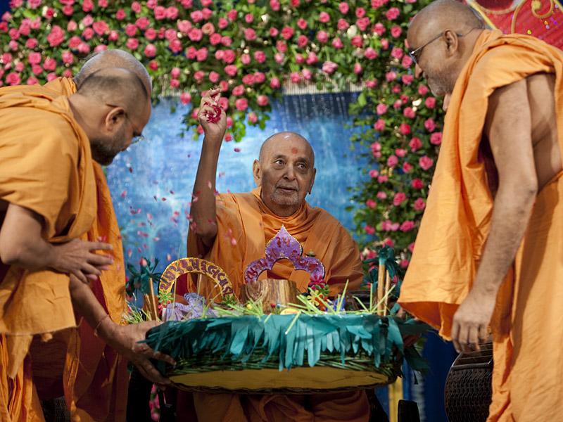  Swamishri is honored with garland