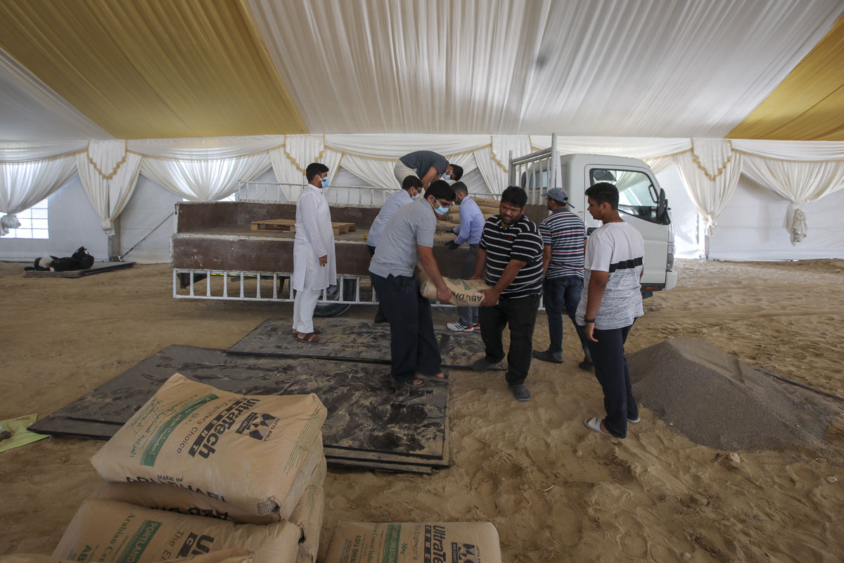 Volunteers preparing interior of the marquee for the Shilanyas Ceremony