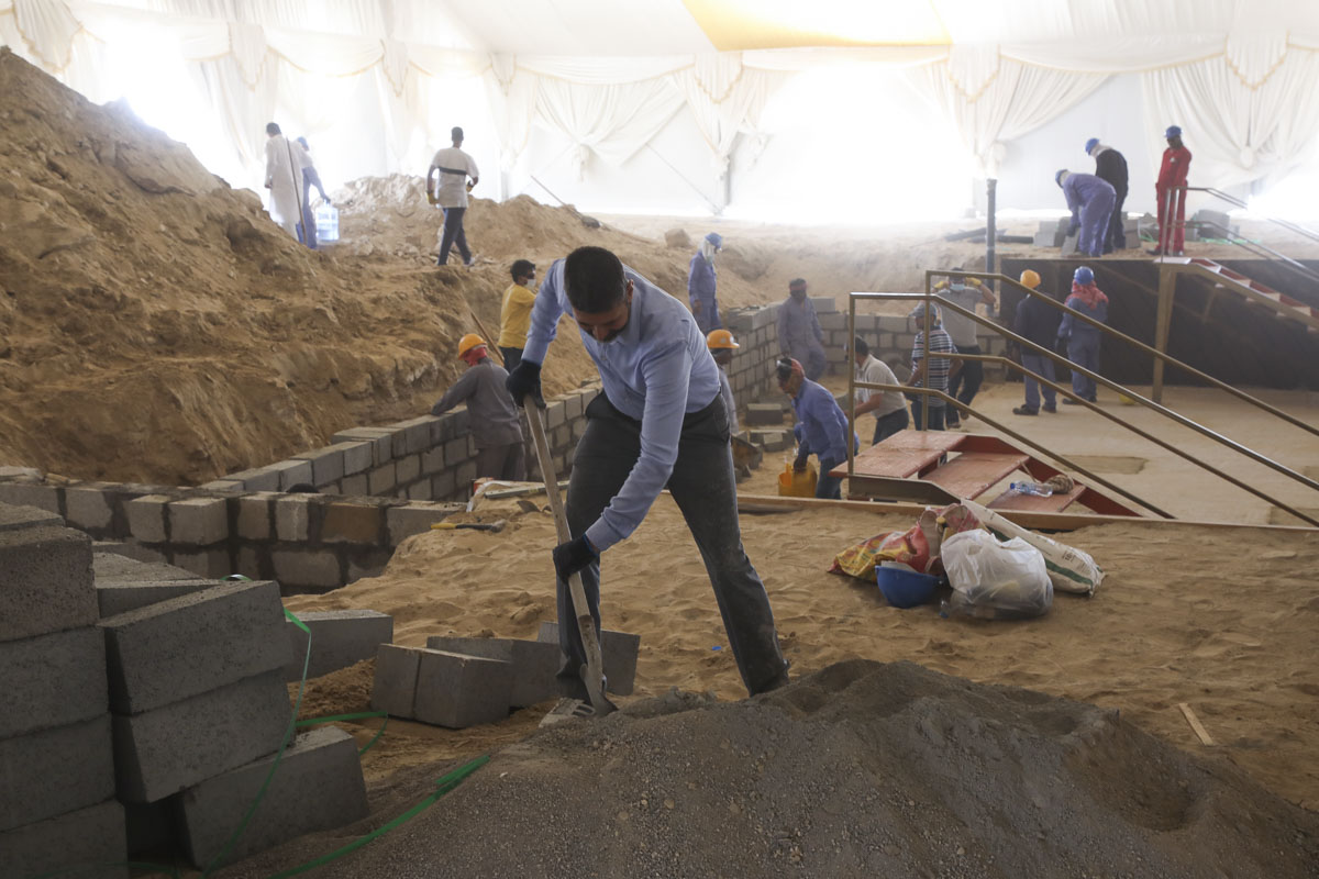 Volunteers preparing interior of the marquee for the Shilanyas Ceremony