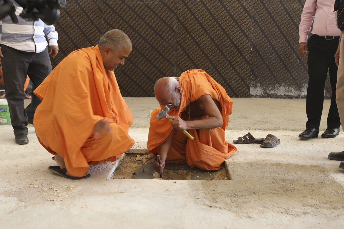 Sadhus prepare the foundations