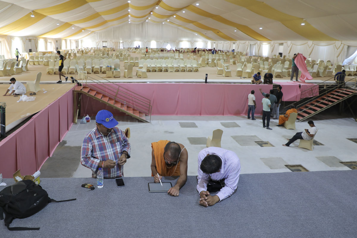 Sadhus and volunteers prepare for the Shilanyas Ceremony
