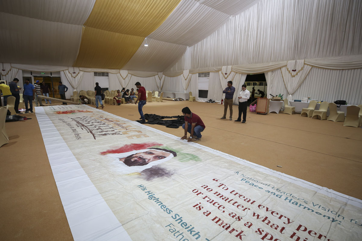 Volunteers prepare for the Shilanyas Ceremony