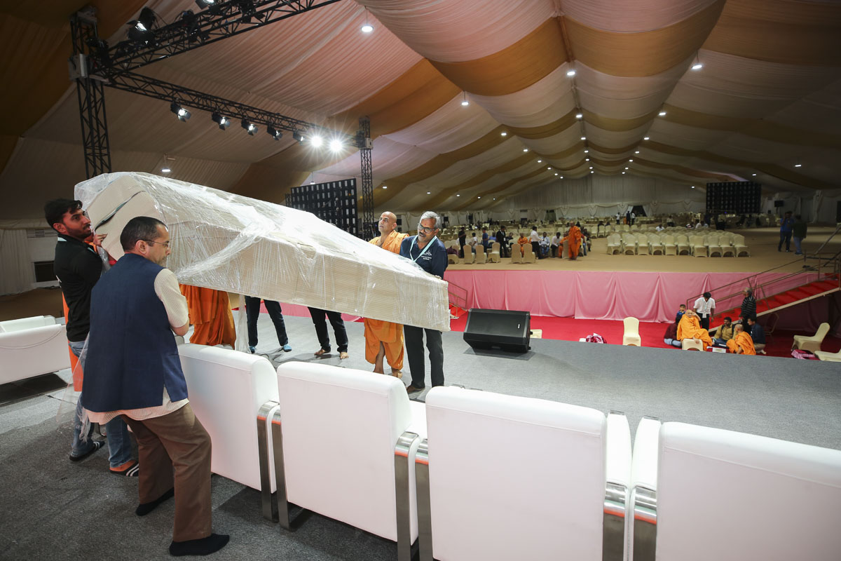 Volunteers prepare for the Shilanyas Ceremony