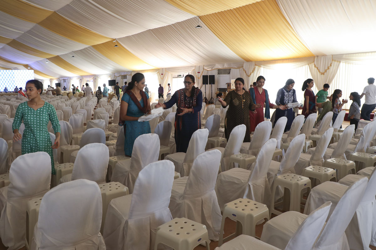 Volunteers prepare for the Shilanyas Ceremony