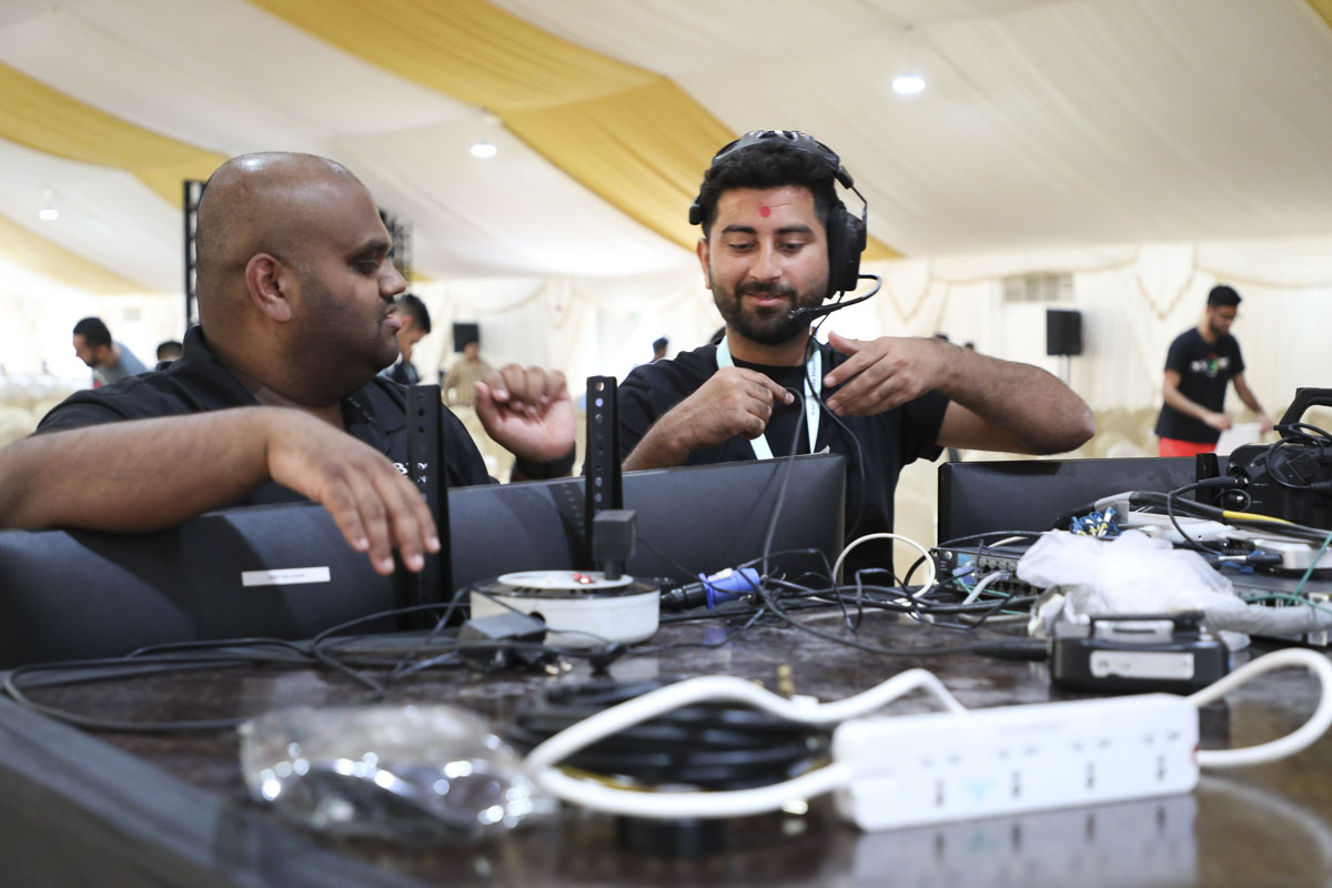 Audio-visual department volunteers prepare for the Shilanyas Ceremony