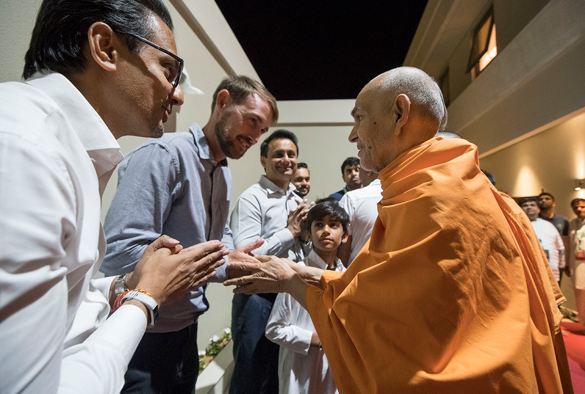 Swamishri blesses a well-wisher