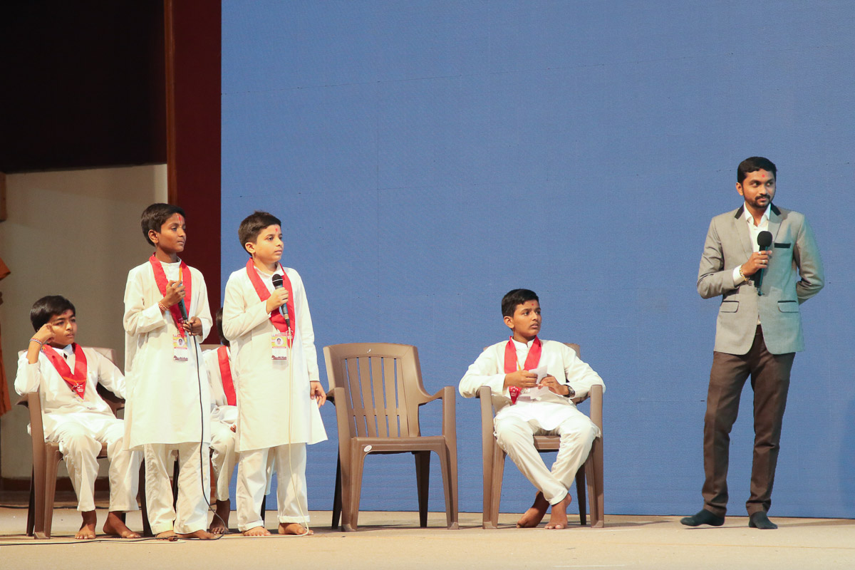 Balaks participate in a debate in the evening session of the shibir