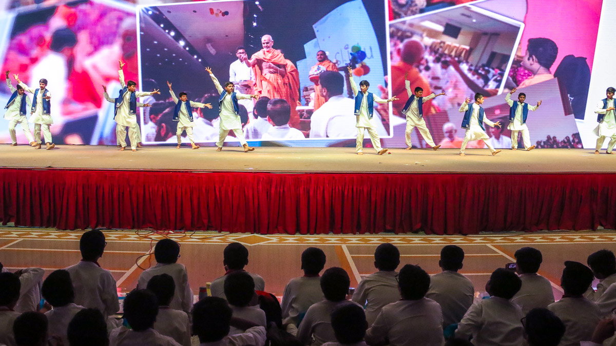 Children perform a traditional dance in the morning session of the shibir