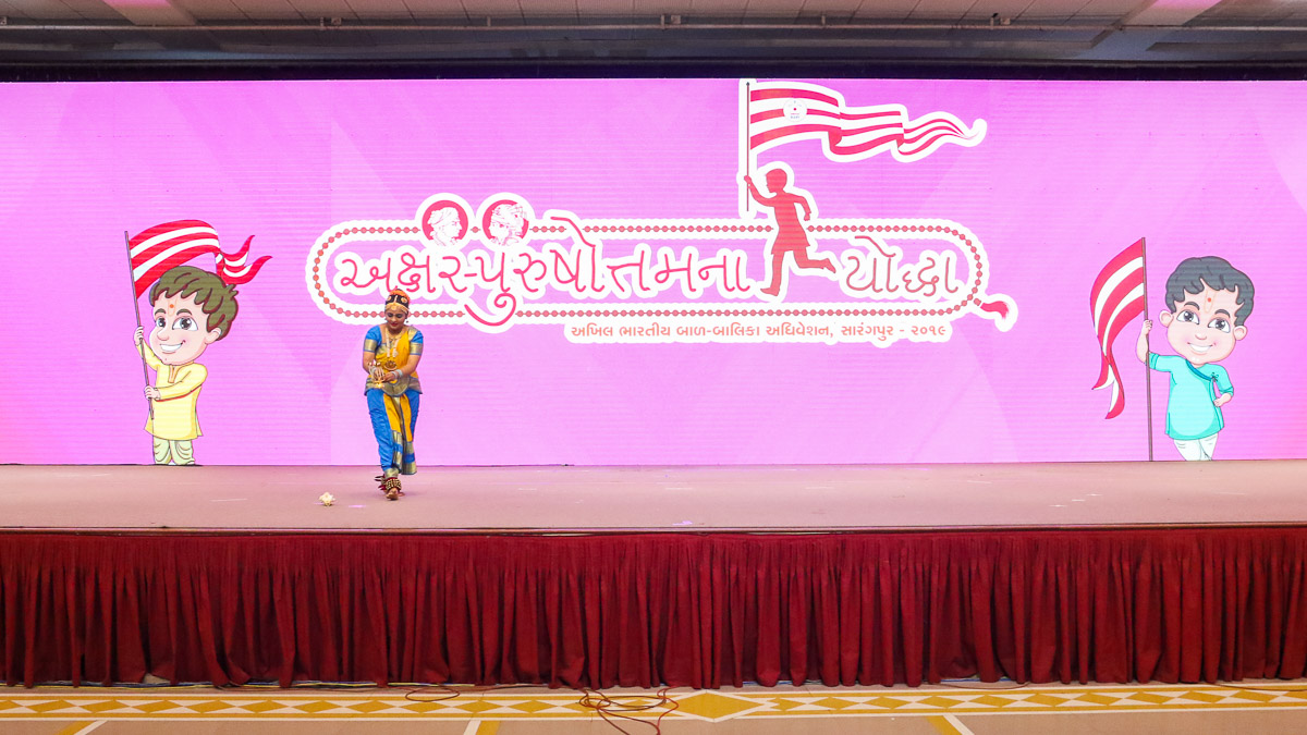 A balika performs a solo dance