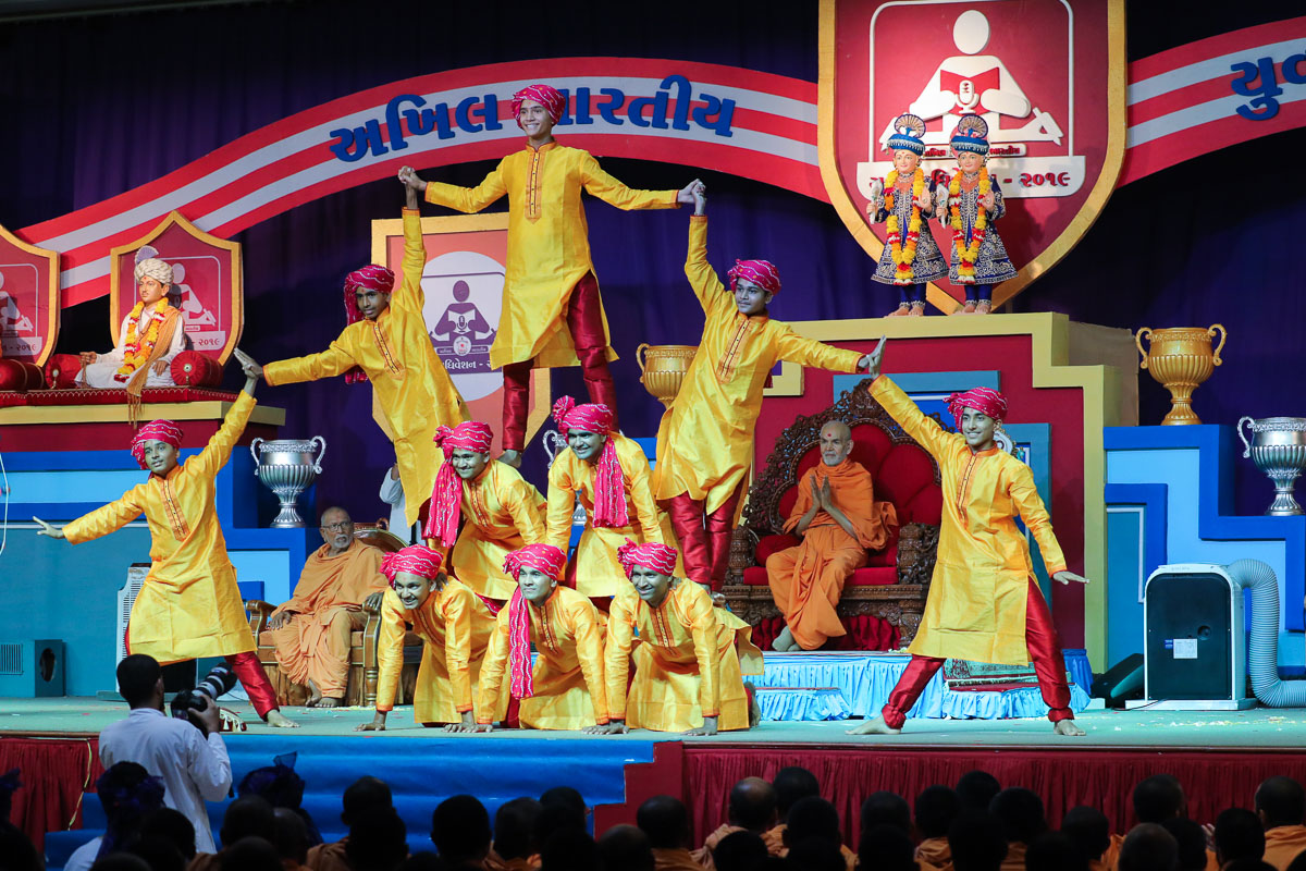 Youths perform a welcome dance
