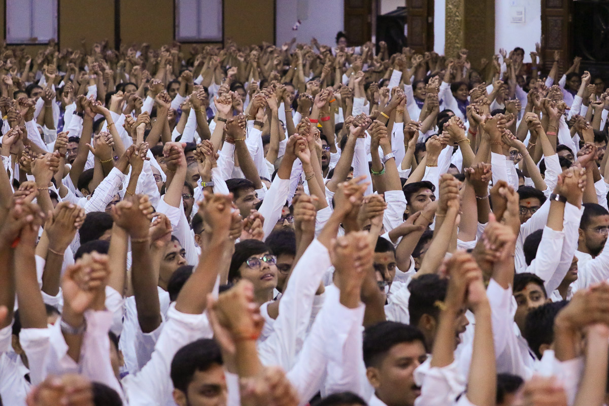 Youths join hands to symbolize unity
