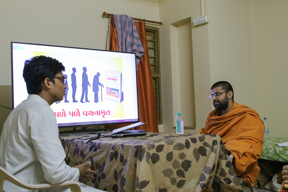 A yuvak participates in the Poster Design competition