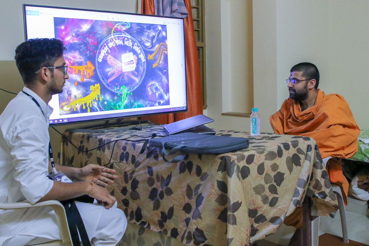 A yuvak participates in the Poster Design competition