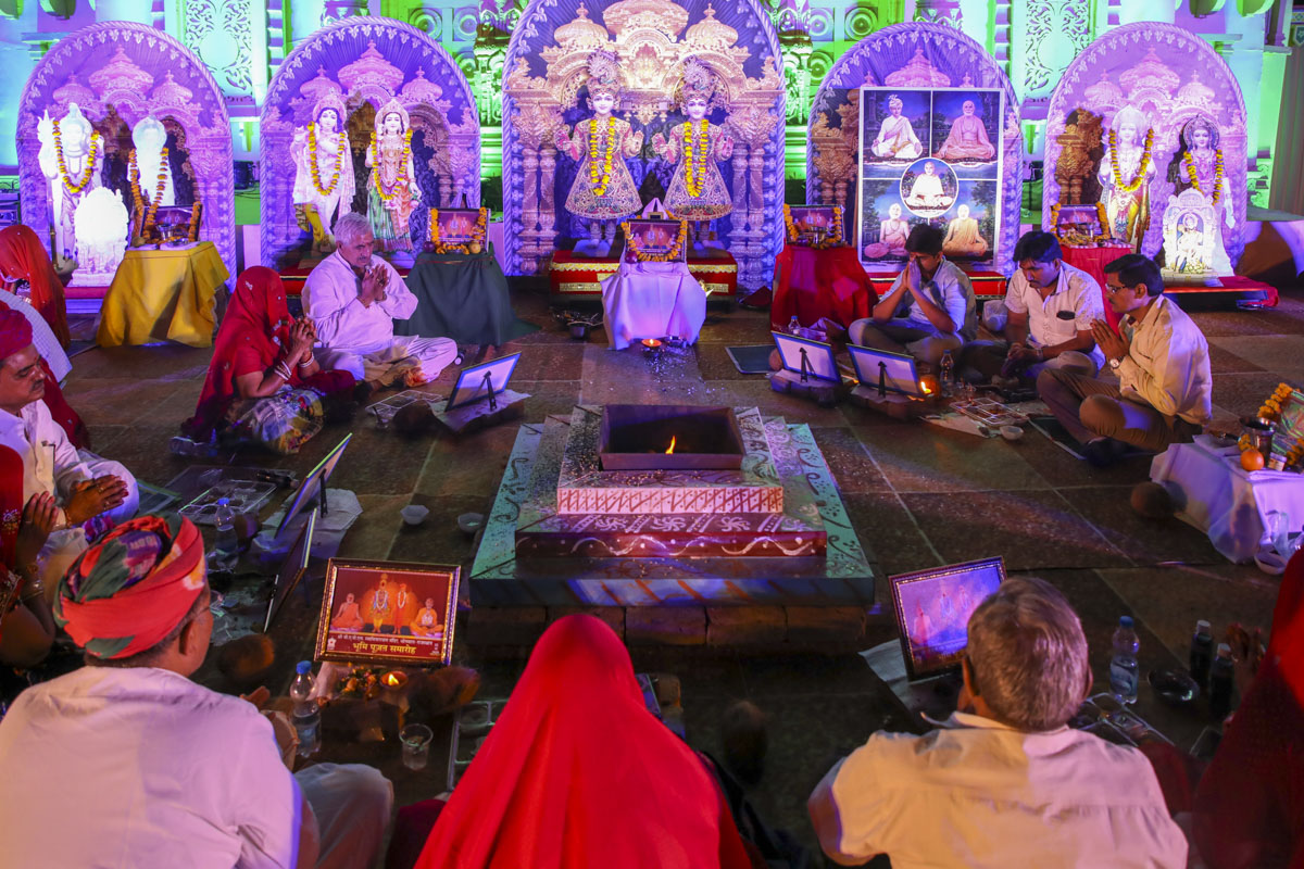 Devotees and well-wishers participate in the yagna rituals