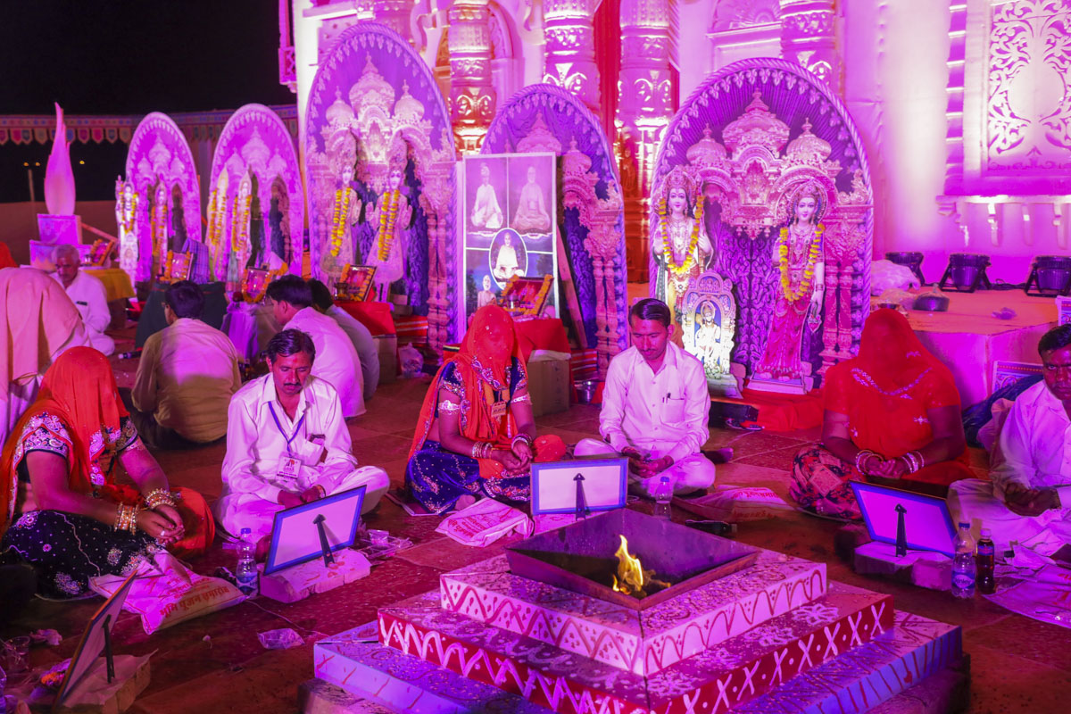 Devotees and well-wishers participate in the yagna rituals