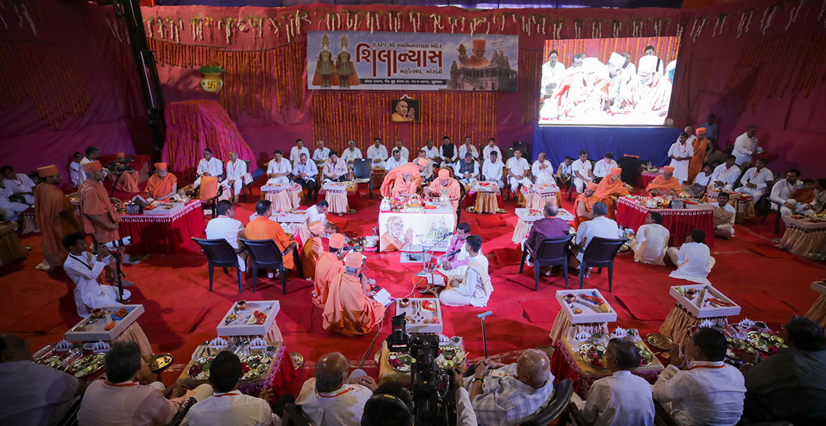 Senior sadhus and devotees perform the Vedic shilanyas mahapuja rituals in the main foundation area