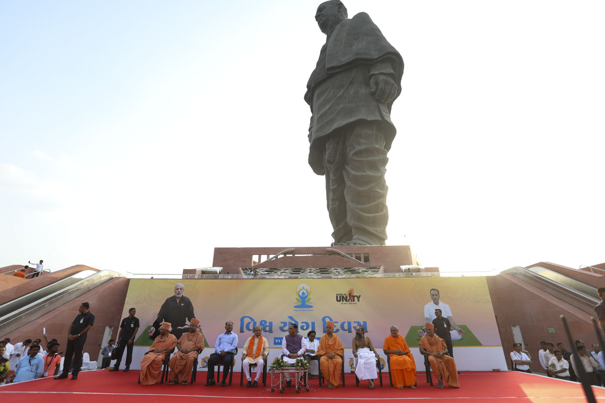 CM Vijaybhai Rupani and invited guests at celebration of International Day of Yoga