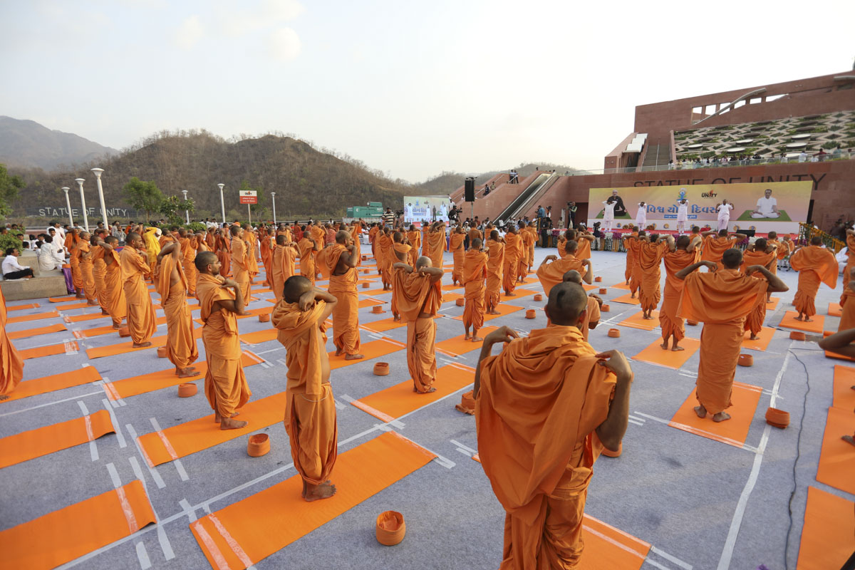 Sadhus perform yoga