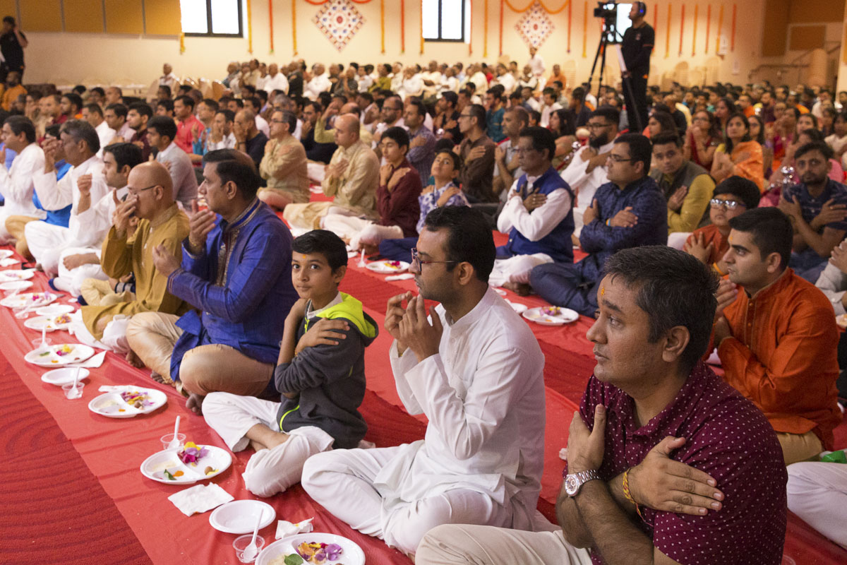 Devotees participate in patotsav mahapuja rituals