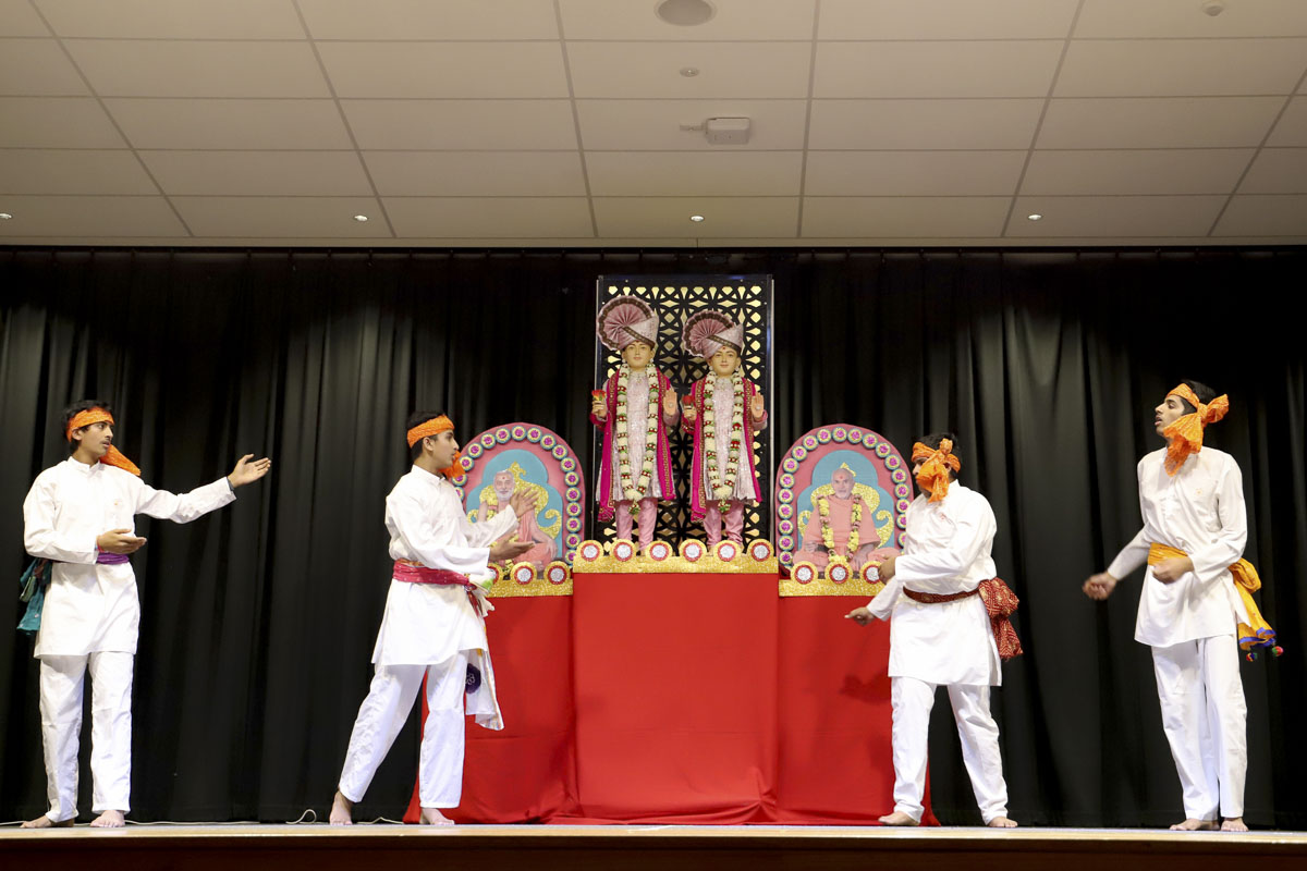 Youths perform a traditional dance