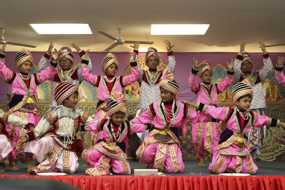 Children perform a traditional dance