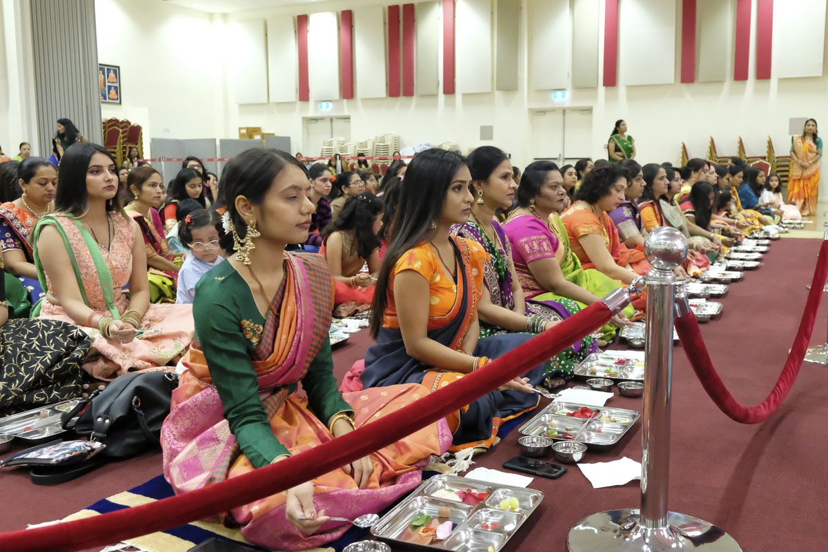 Devotees participate in patotsav mahapuja rituals