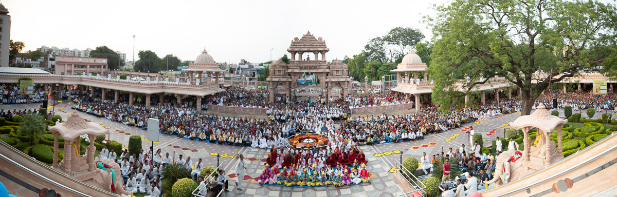 Devotees in the mandir grounds during the welcome assembly