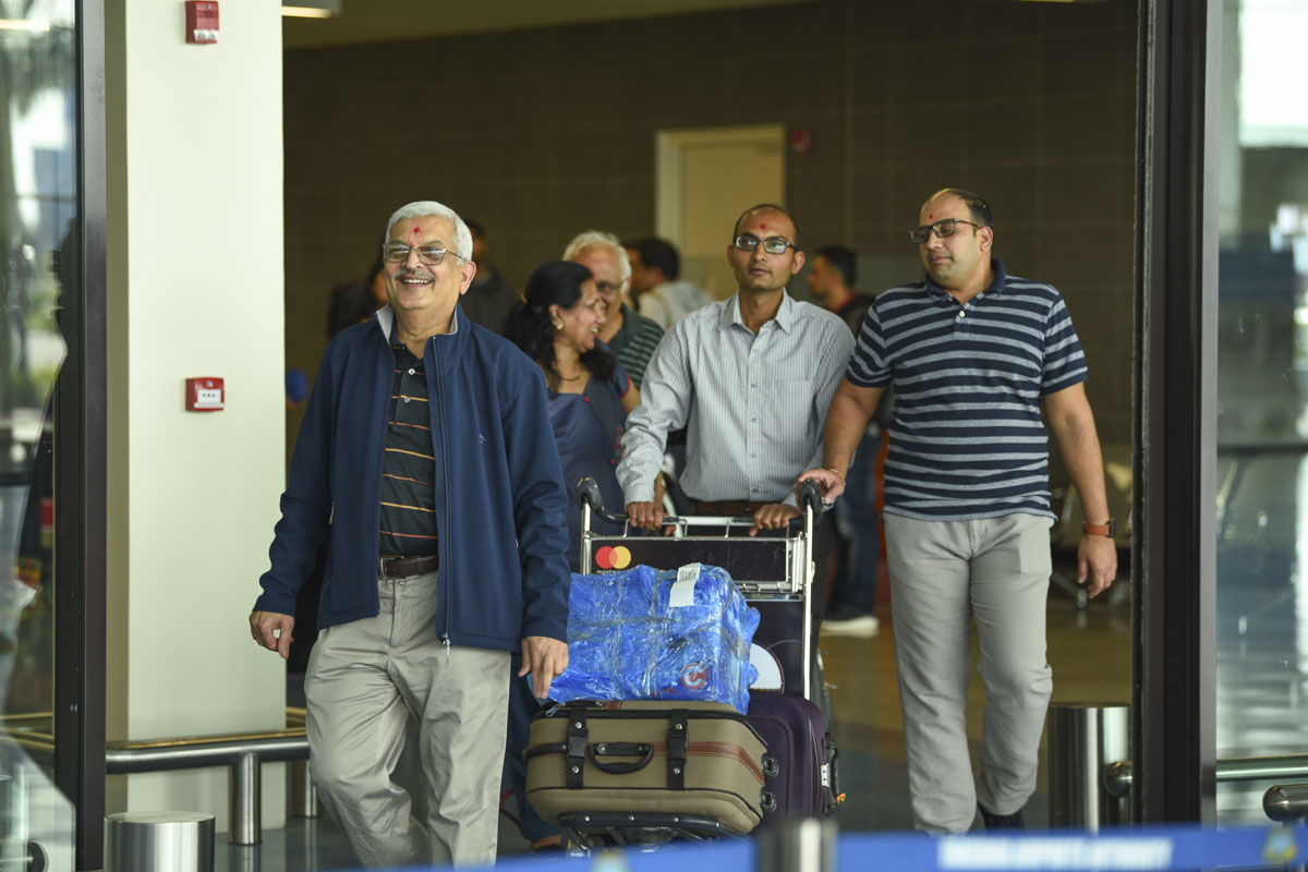 Karyakars arrive at the airport