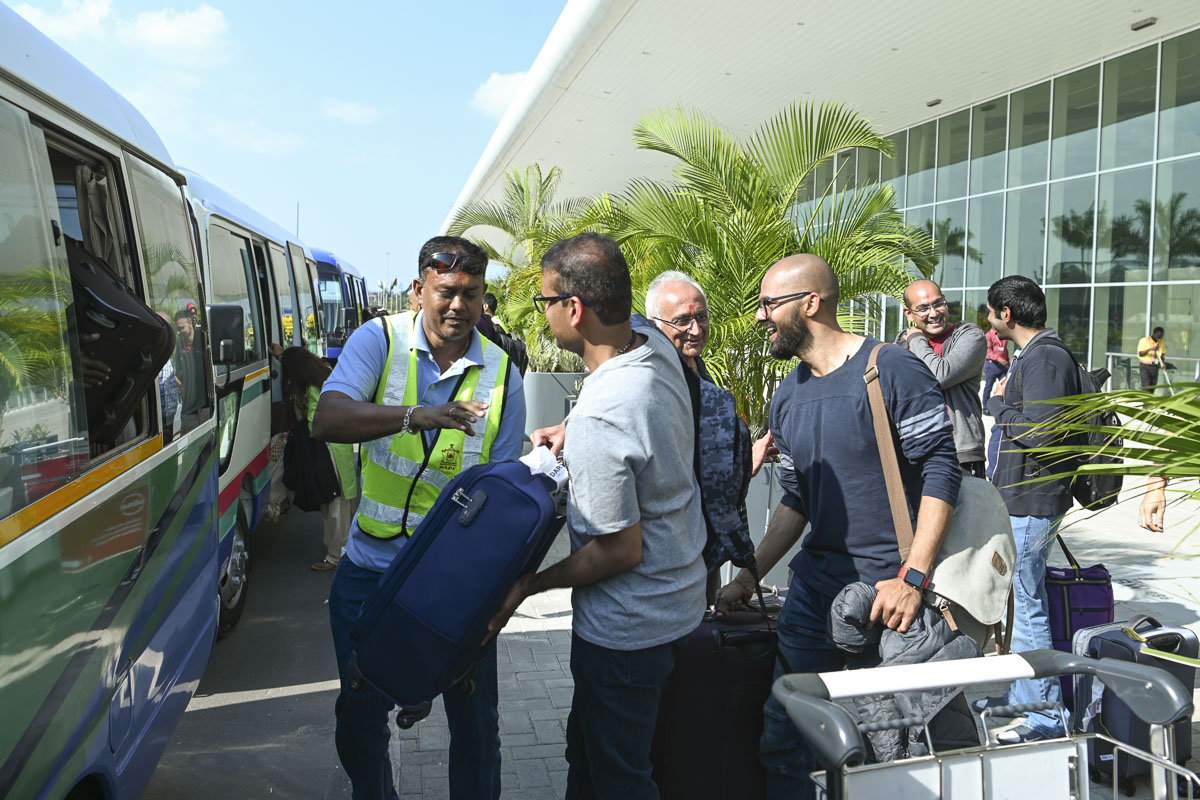 Karyakars arrive at the airport