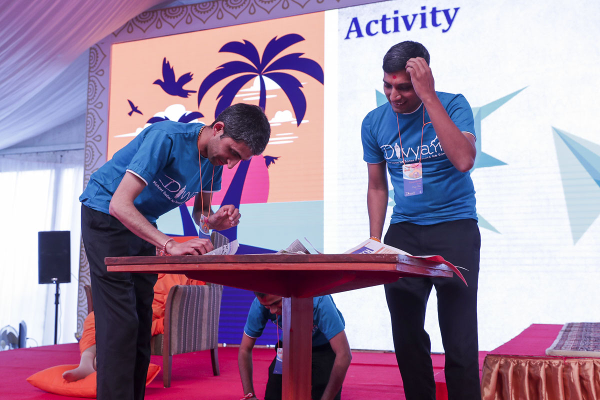 Karyakars participate in an activity