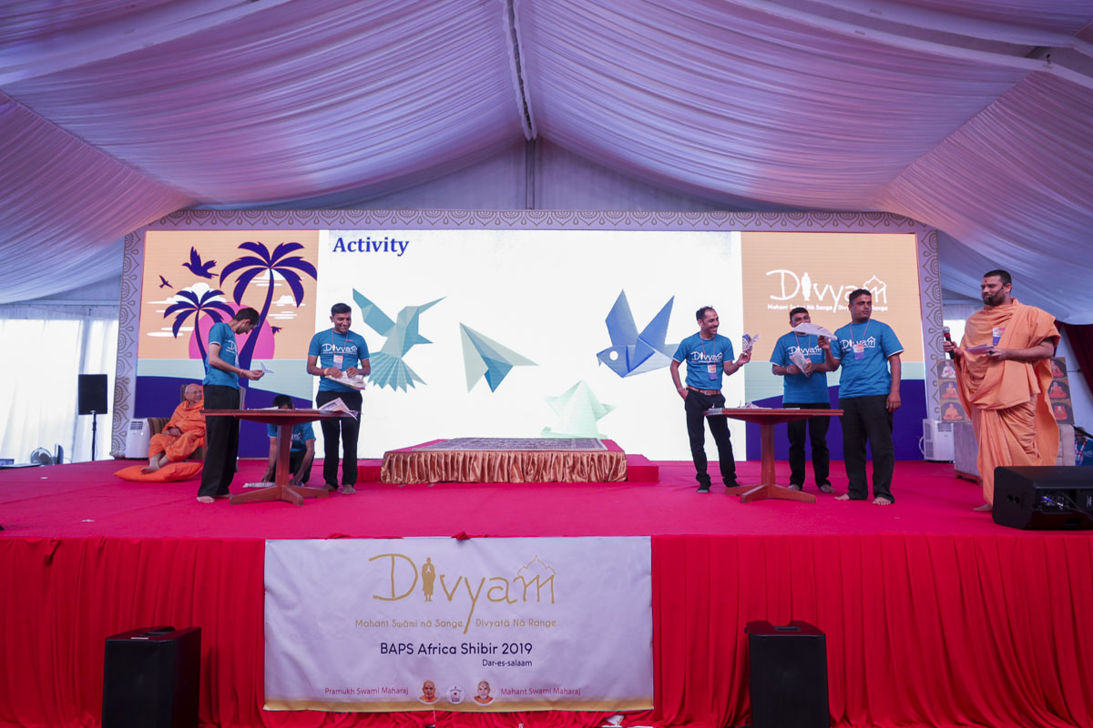 Karyakars participate in an activity