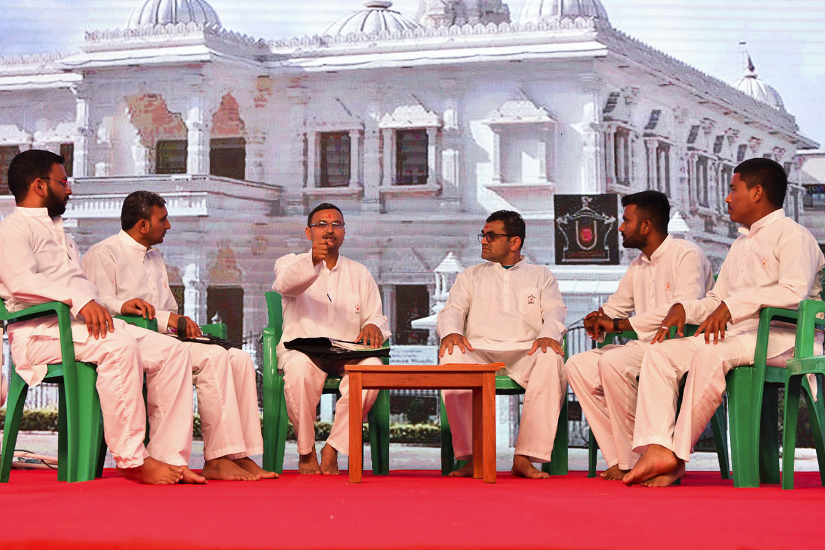 Karyakars participate in an activity